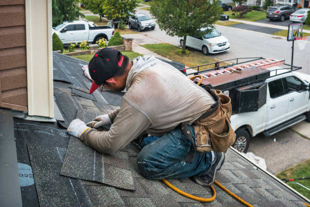 Professional Roofing technician working in Weston, OR